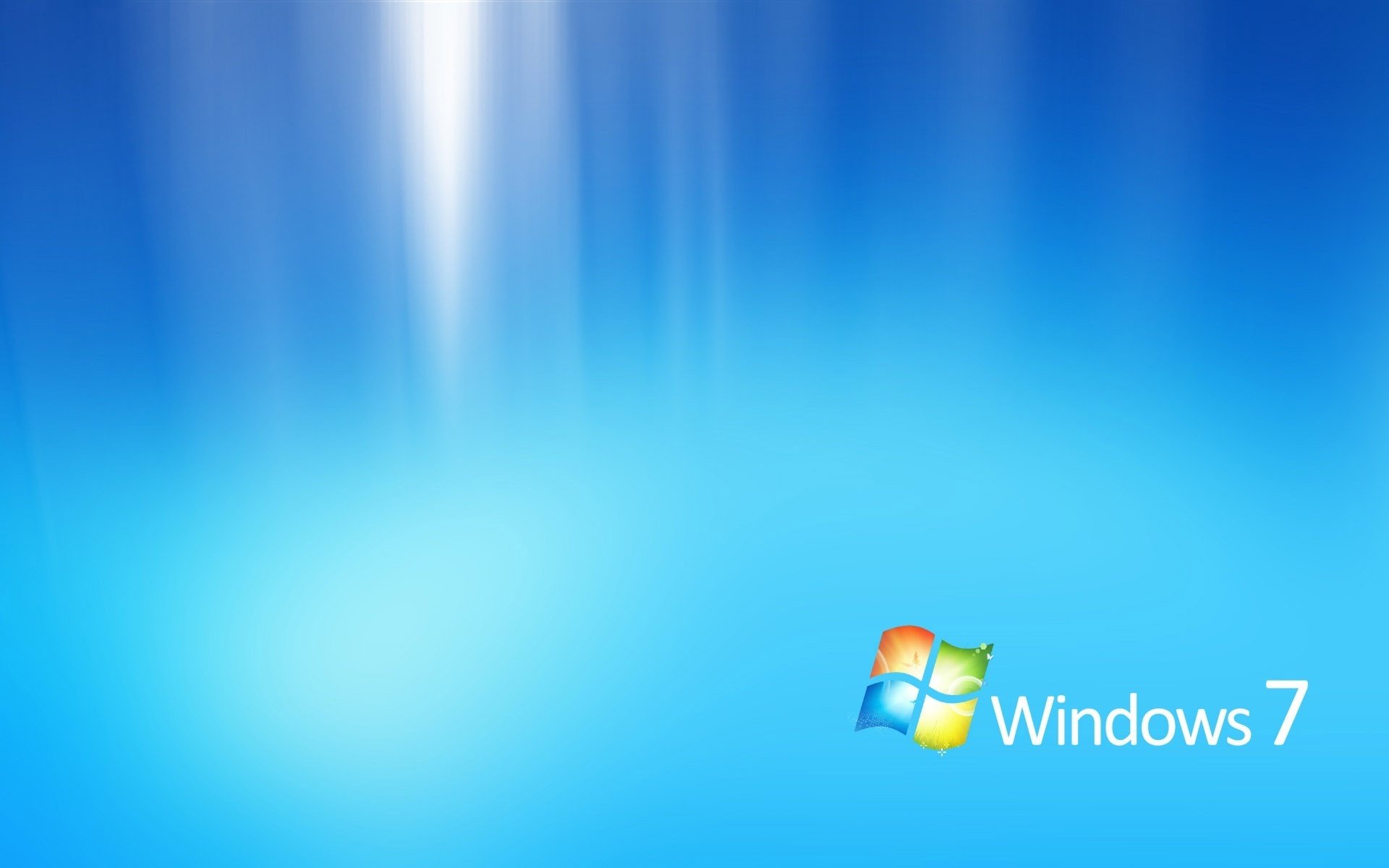 Логотип microsoft windows 7 на синем подсвеченном фоне