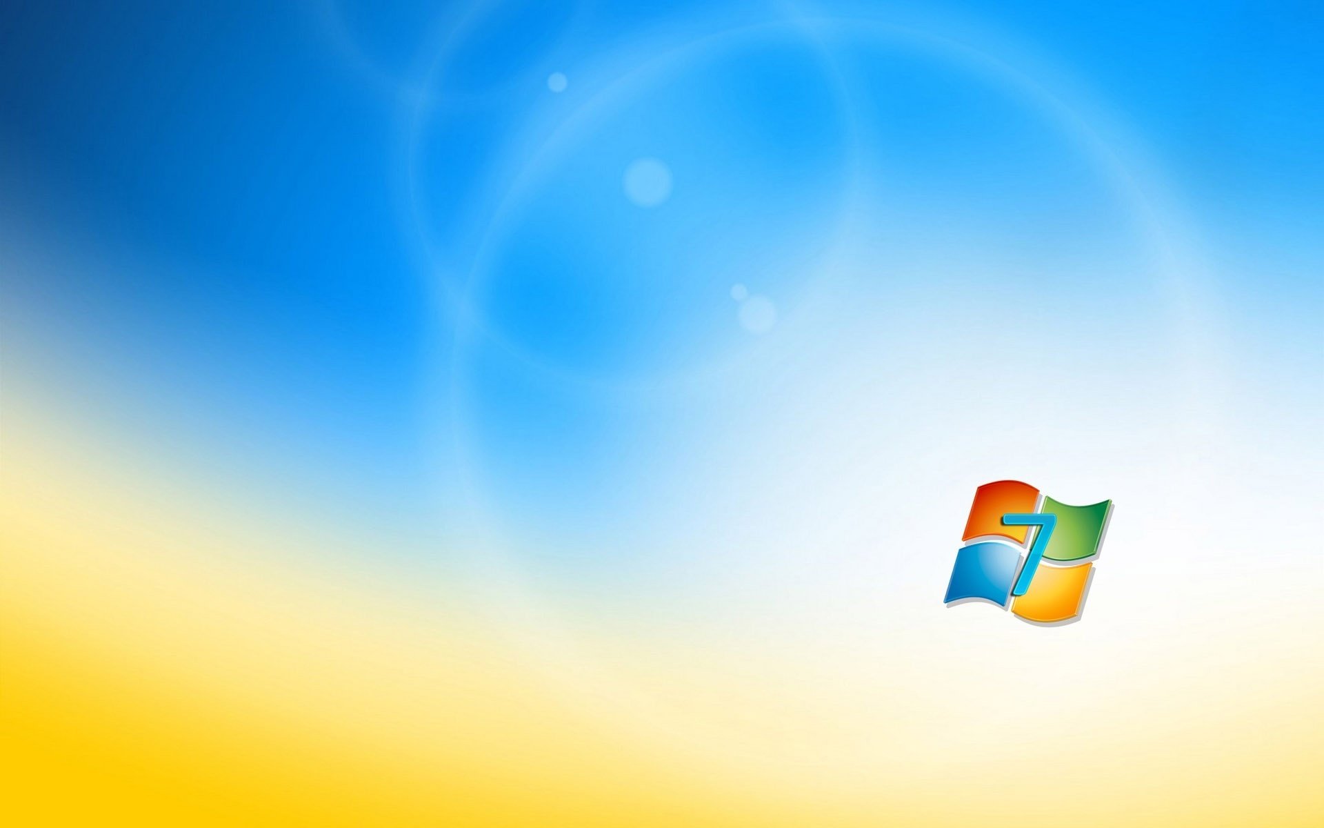 Логотип microsoft windows 7на размытом фоне напоминающем пшеничное поле и небо