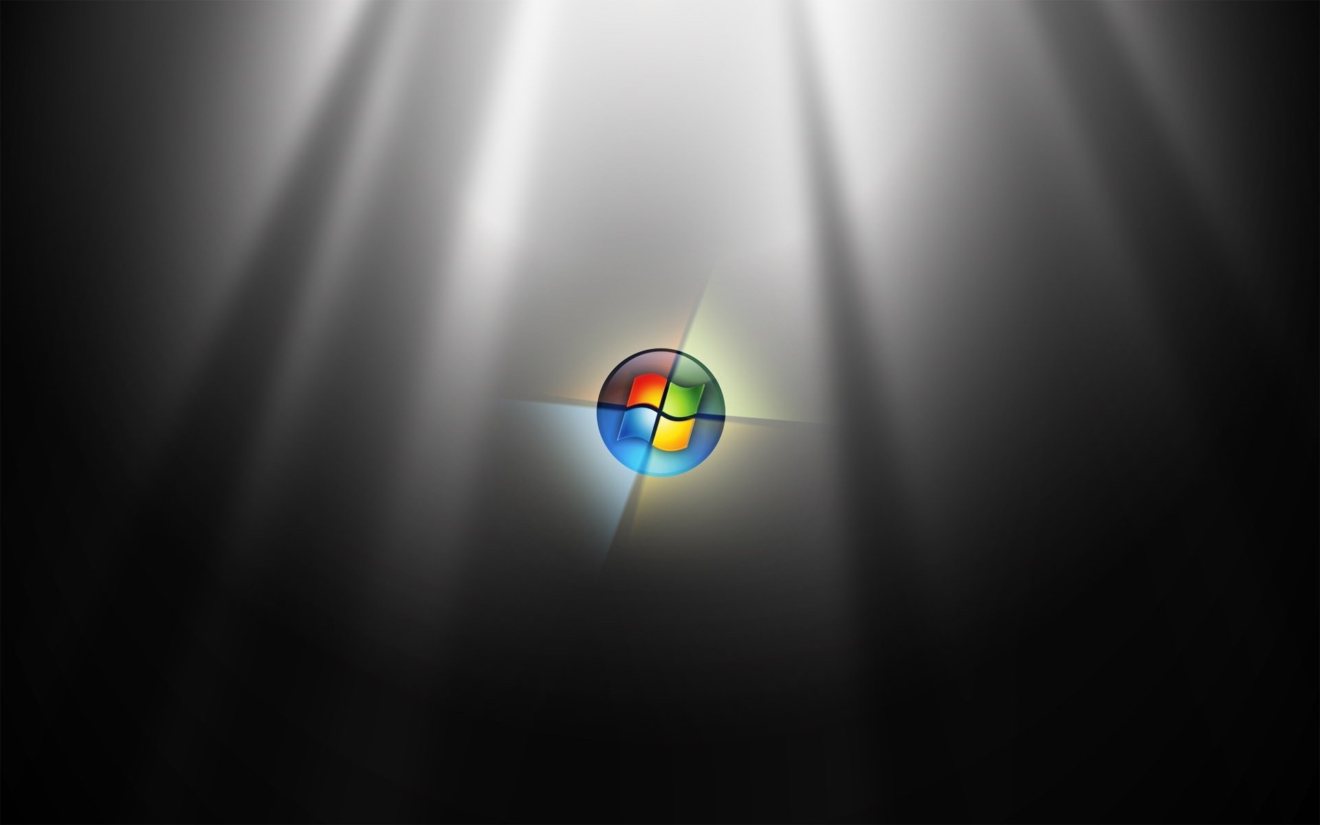 Подсвеченный логотип microsoft windows 7 на черном фоне